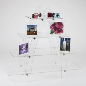 Modern and contemporary clear acrylic ladder style display shelving 